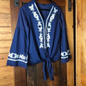 Super cute blouse! Bell sleeves, tie waist.